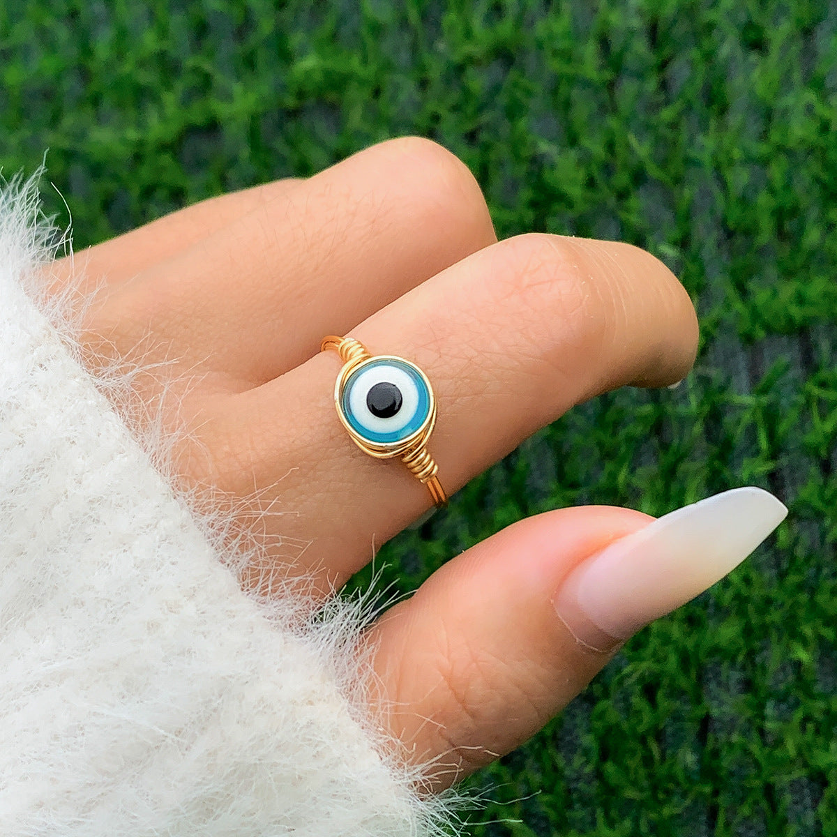 Anillo de ojos azules acrílicos al por mayor